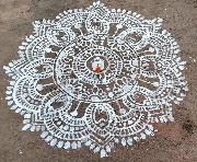 The 'Jhoti Chita' holds divine importance on Manabasa Gurubar in Odisha. This traditional art form involves creating intricate and flamboyant designs with rice paste on the floor, especially at the doorstep and in the worship area of the house