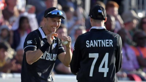 Trent Boult with Mitchell Santner