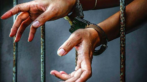 A woman lecturer and his son in Jagatsinghpur district has been arrested on charges of torturing her daughter-in-law over dowry.