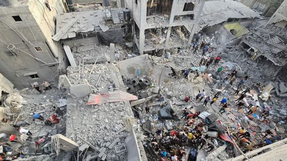 At least 37 Palestinians were killed and more than 100 others injured in a massive Israeli attack on the al-Mughazi refugee camp in the central Gaza Strip, the Gaza-based Health Ministry has said.