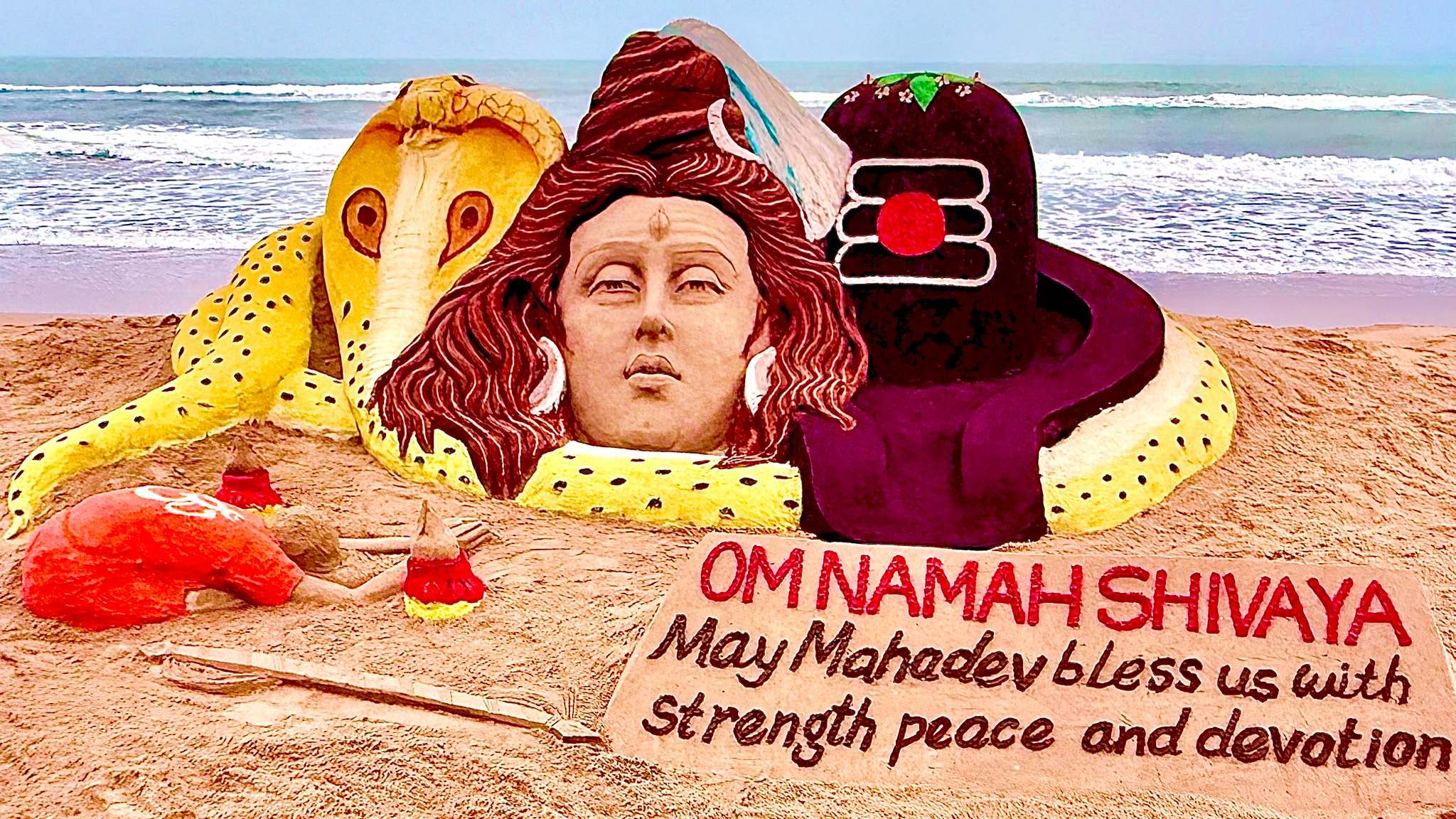Internationally acclaimed sand artist Sudarsan Pattnaik has created a mesmerizing sand sculpture of Lord Shiva on Puri beach on Monday.