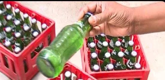 Huge cache of liquor packed in Sprite bottles seized: Smugglers held