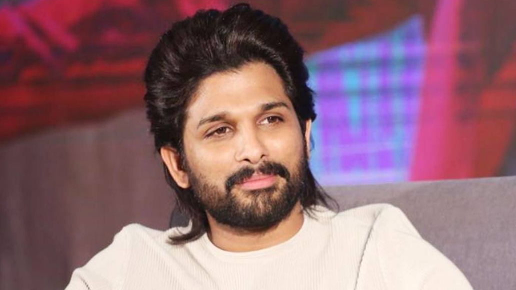 The video that went viral on social media, shows Allu Arjun in a black kurta and white pyjama. He is seen coming out of the sun roof of his car, and waving at people. The fans are showering flower petals on him