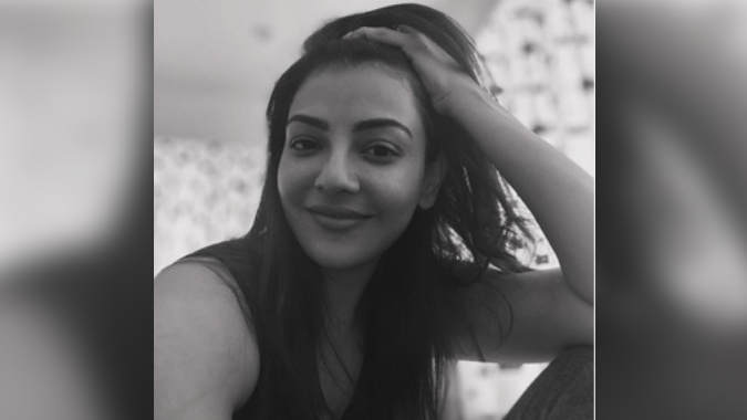 Kajal took to Instagram and shared a black-and-white picture of herself posing with her hair open.