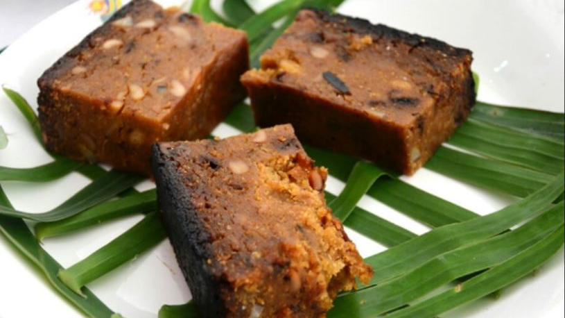Poda Pitha is a traditional Odia delicacy, especially prepared during Raja Festival, which celebrates womanhood and the onset of the monsoon. The name "Poda" means "burnt" or "baked," and "Pitha" means "cake." This dish is made by slow-cooking fermented rice batter with jaggery and coconut, traditionally over a wood fire